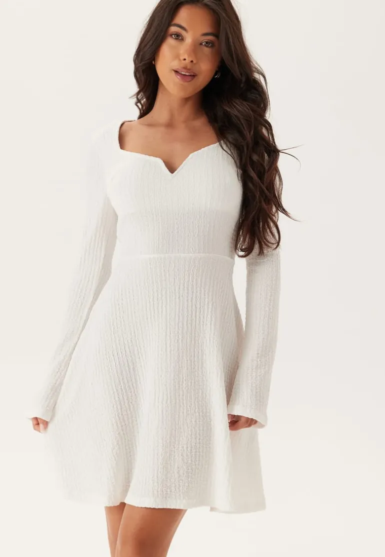Structured V-neck Skater Dress